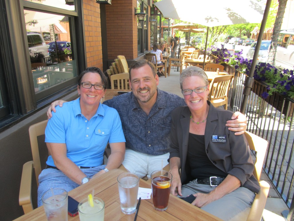 Kris Hermanns and Steve Martin meet in July in Boise with former Idaho Sen. and openly gay politician Nicole LeFavour, who is running for United States Congress.