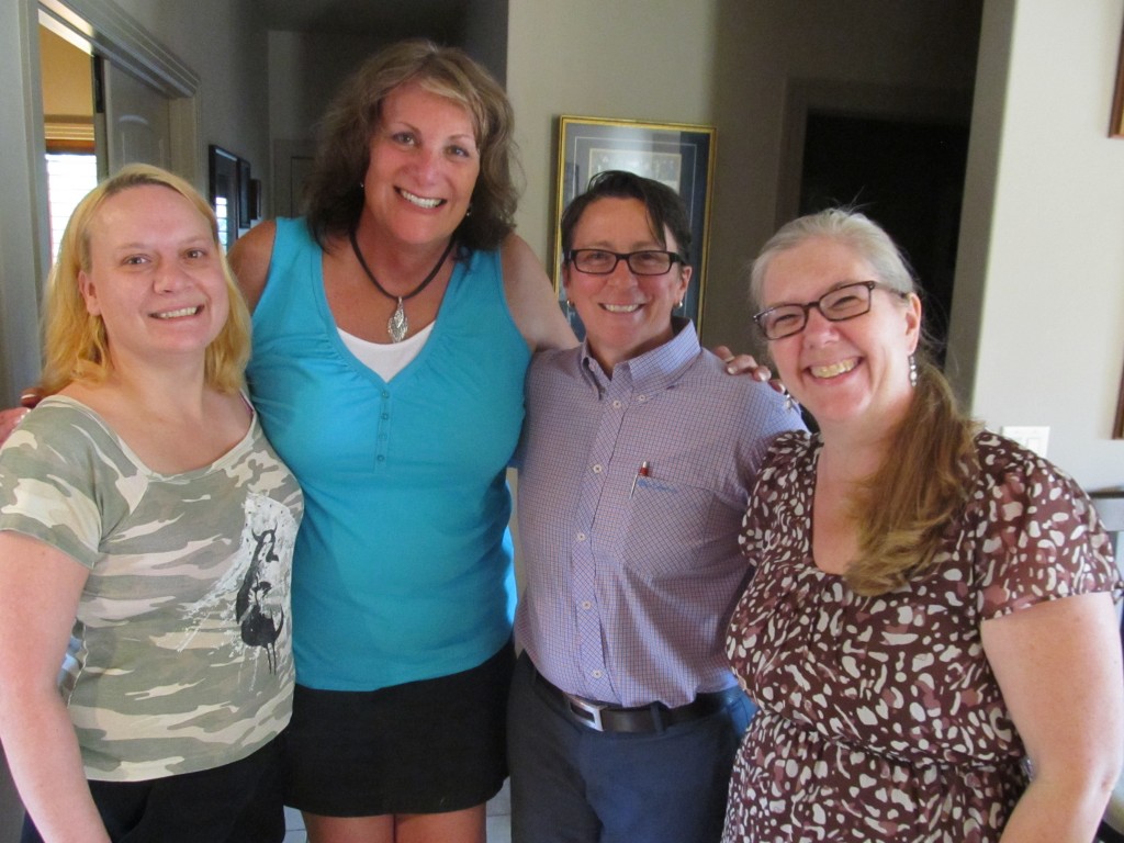 Pride Foundation ED Kris Hermanns meets Idaho Leadership Action Team members Stephanie Bell, Emilie Jackson-Edney and Lucy Groves in Boise in July.