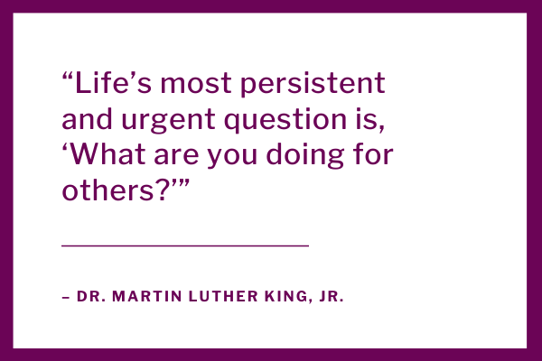 Quote from Dr. Martin Luther King Jr., dark plum text over a stark white background and a dark plum border